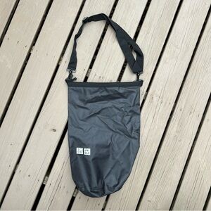 Uniqlo Dry Bag in Black with removable multi position adjustable strap